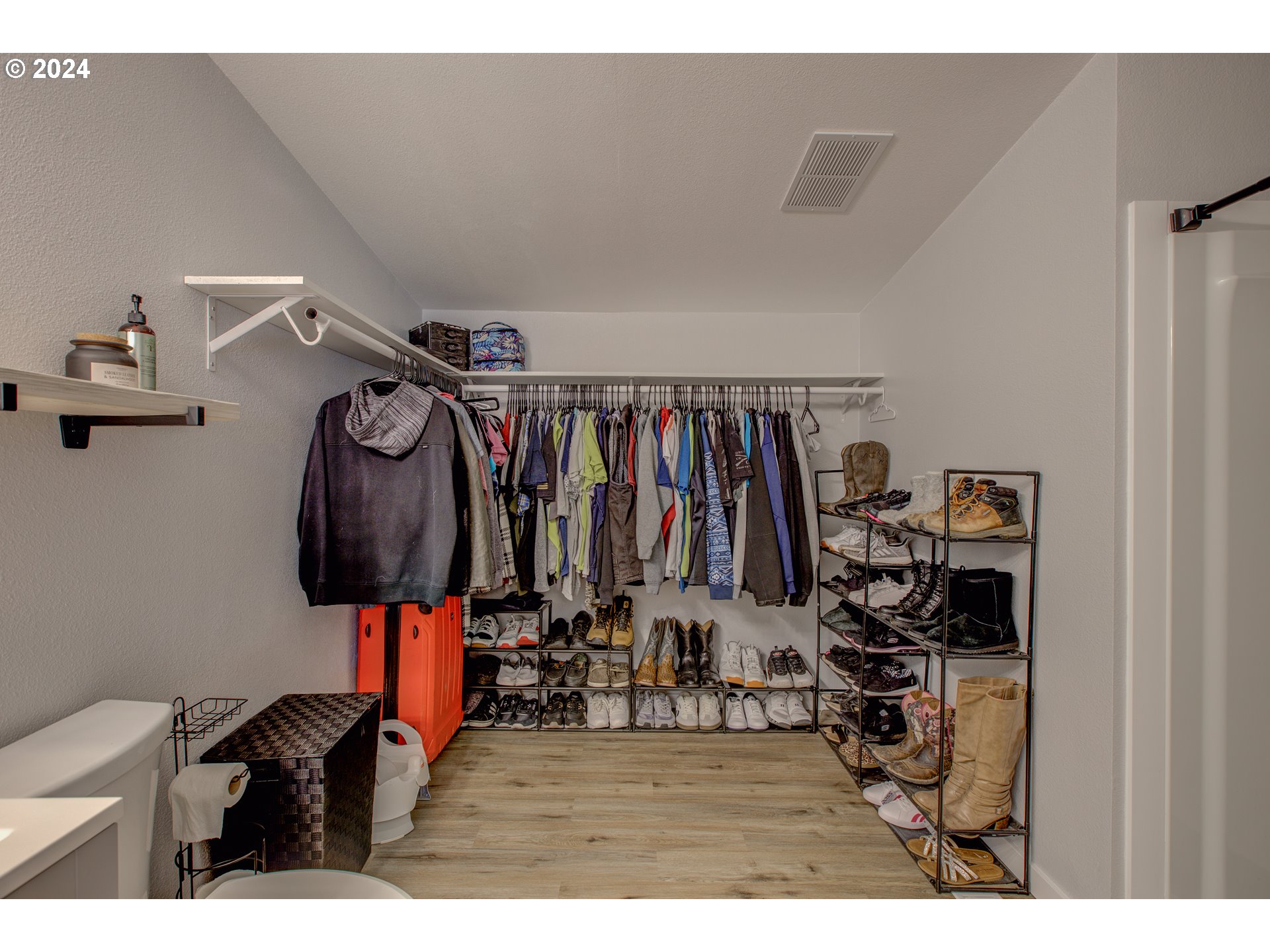 929 Northeast Rifle Range Street Roseburg, OR 97470 - Photo 23 of 48 a view of walk in closet with clothes and shoes