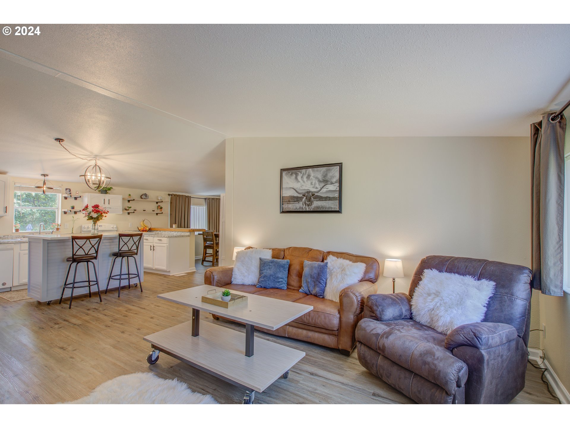 929 Northeast Rifle Range Street Roseburg, OR 97470 - Photo 3 of 48 a living room with furniture and wooden floor