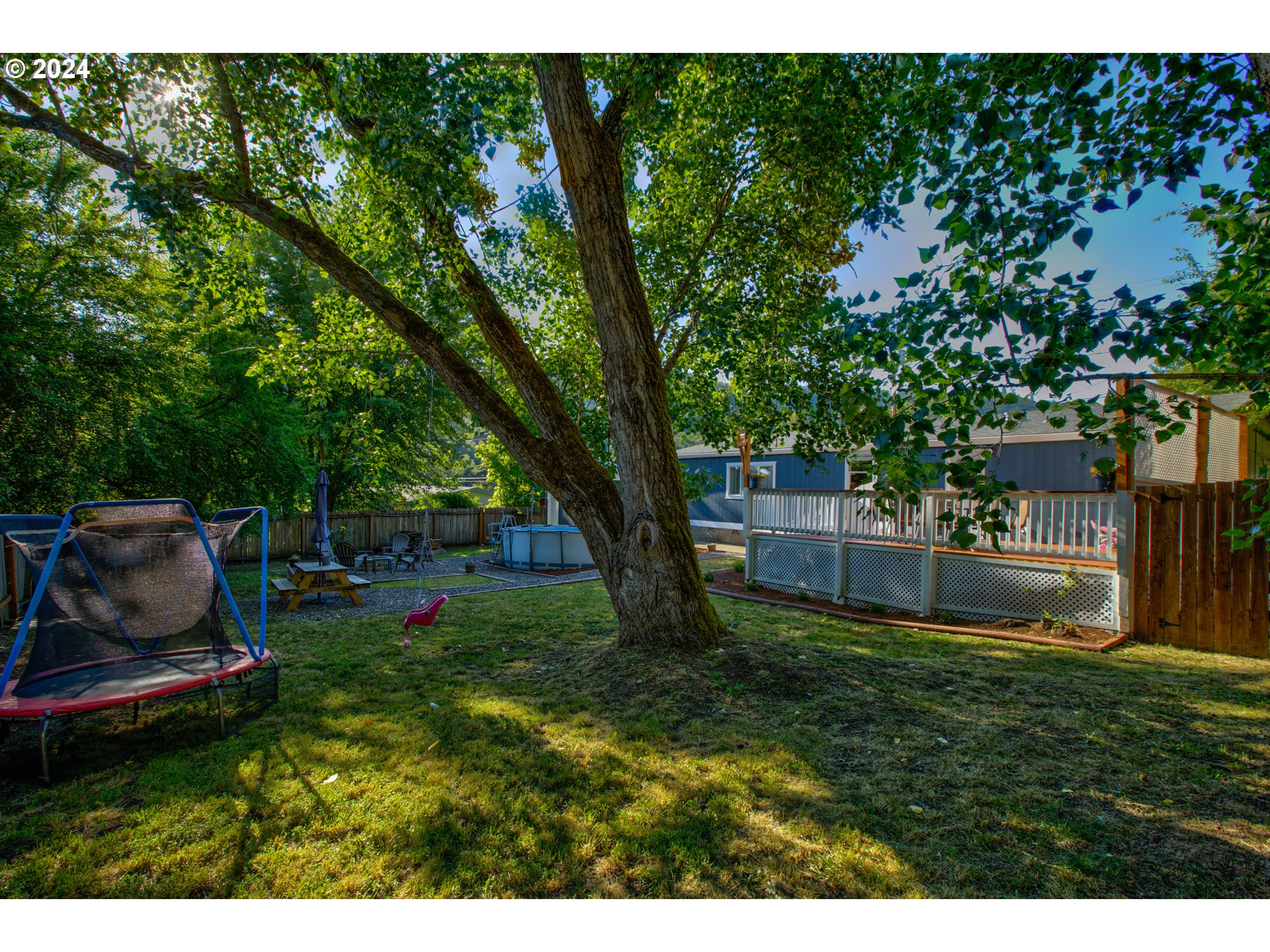 929 Northeast Rifle Range Street Roseburg, OR 97470 - Photo 47 of 48 a view of a garden with an outdoor space