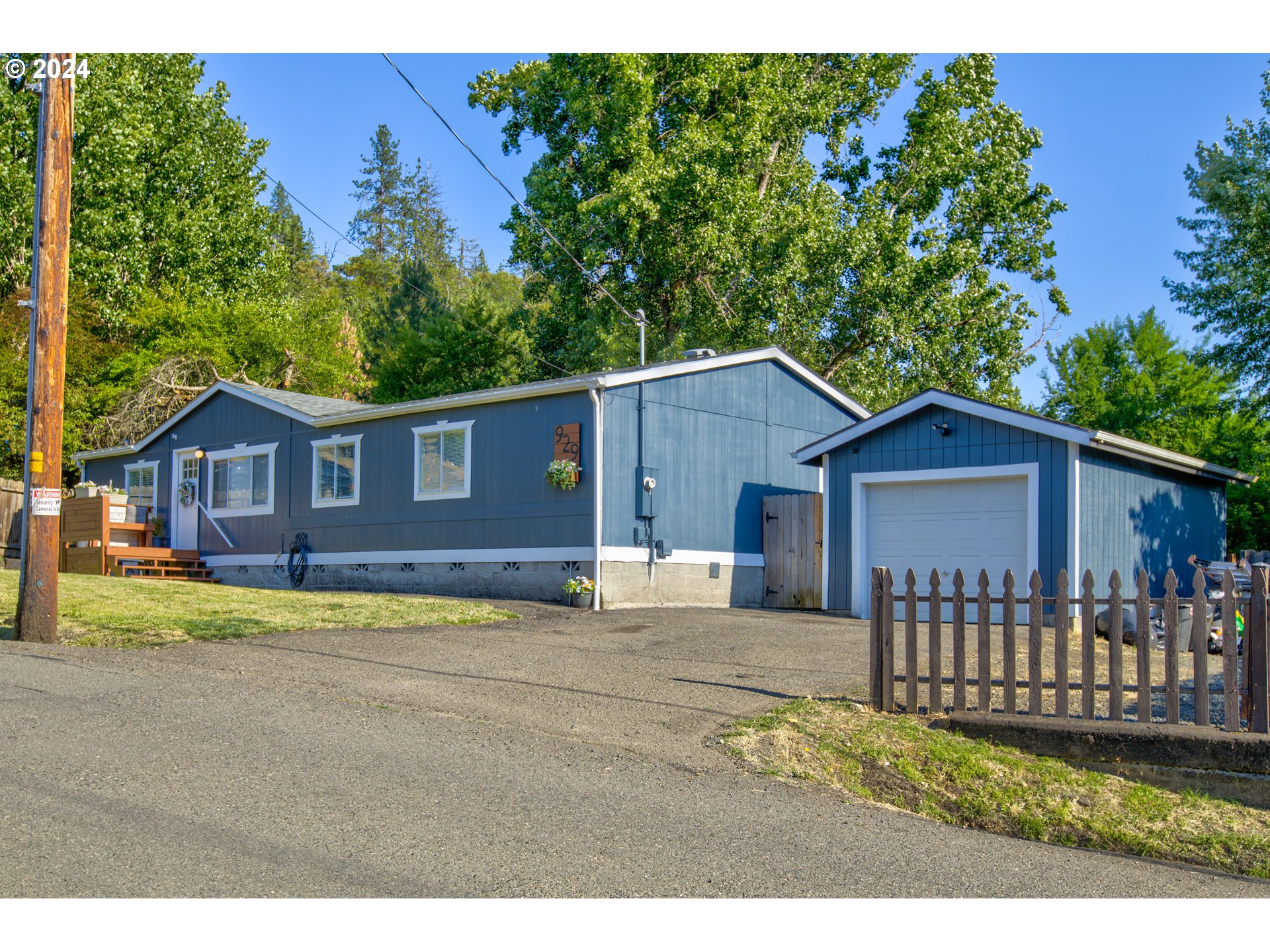 929 Northeast Rifle Range Street Roseburg, OR 97470 - Photo 48 of 48 a view of a house with a yard