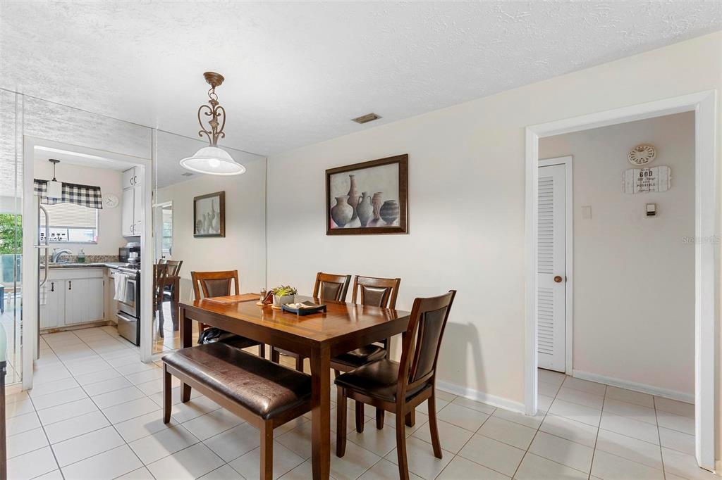 4376 Lake Underhill Road, Unit C Orlando, FL 32803 - Photo 13 of 41 a view of a dining room with furniture