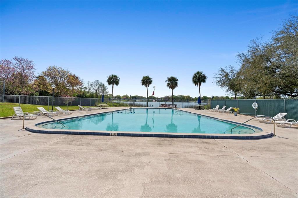4376 Lake Underhill Road, Unit C Orlando, FL 32803 - Photo 24 of 41 a view of a swimming pool