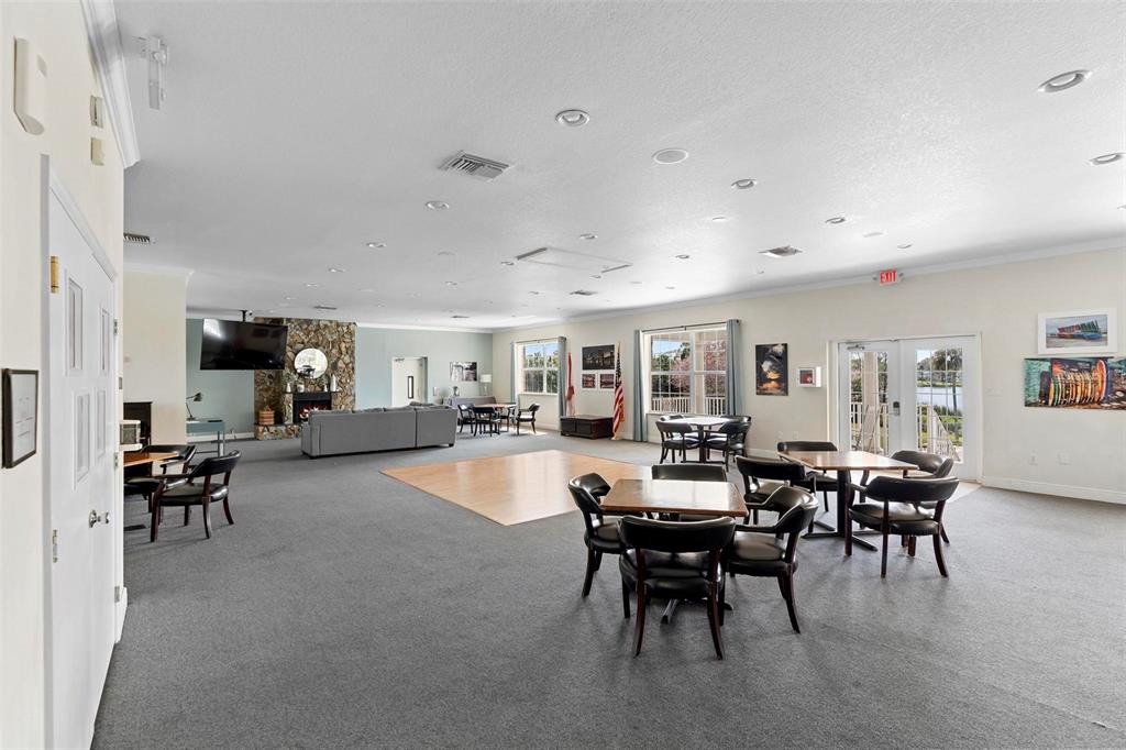4376 Lake Underhill Road, Unit C Orlando, FL 32803 - Photo 29 of 41 a view of a dining room with furniture and chandelier
