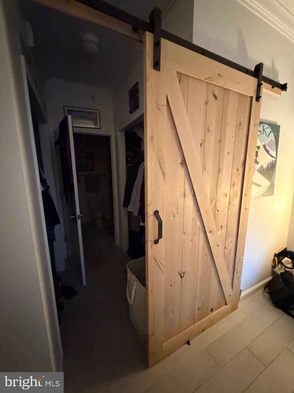 1111 11th Street Northwest, Unit 108 Washington, DC 20001 - Photo 14 of 27 Charming barn door adds rustic flair.