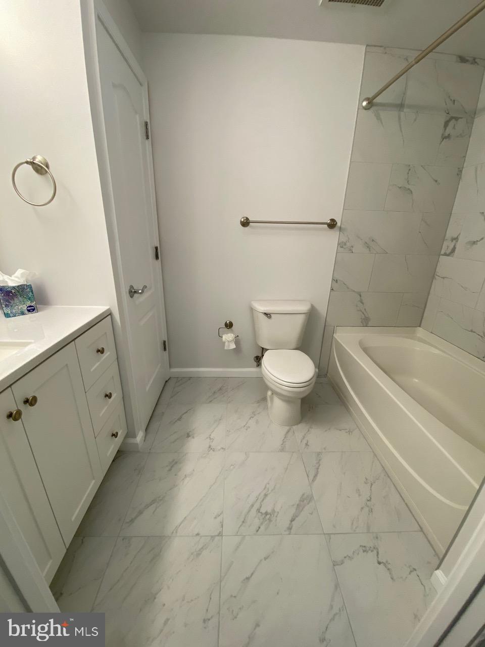 1111 11th Street Northwest, Unit 108 Washington, DC 20001 - Photo 15 of 27 Modern bathroom with elegant marble tiles.