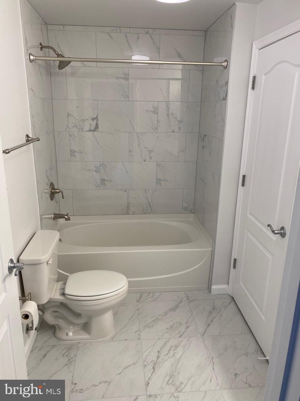 1111 11th Street Northwest, Unit 108 Washington, DC 20001 - Photo 18 of 27 Modern bathroom with elegant marble finishes.