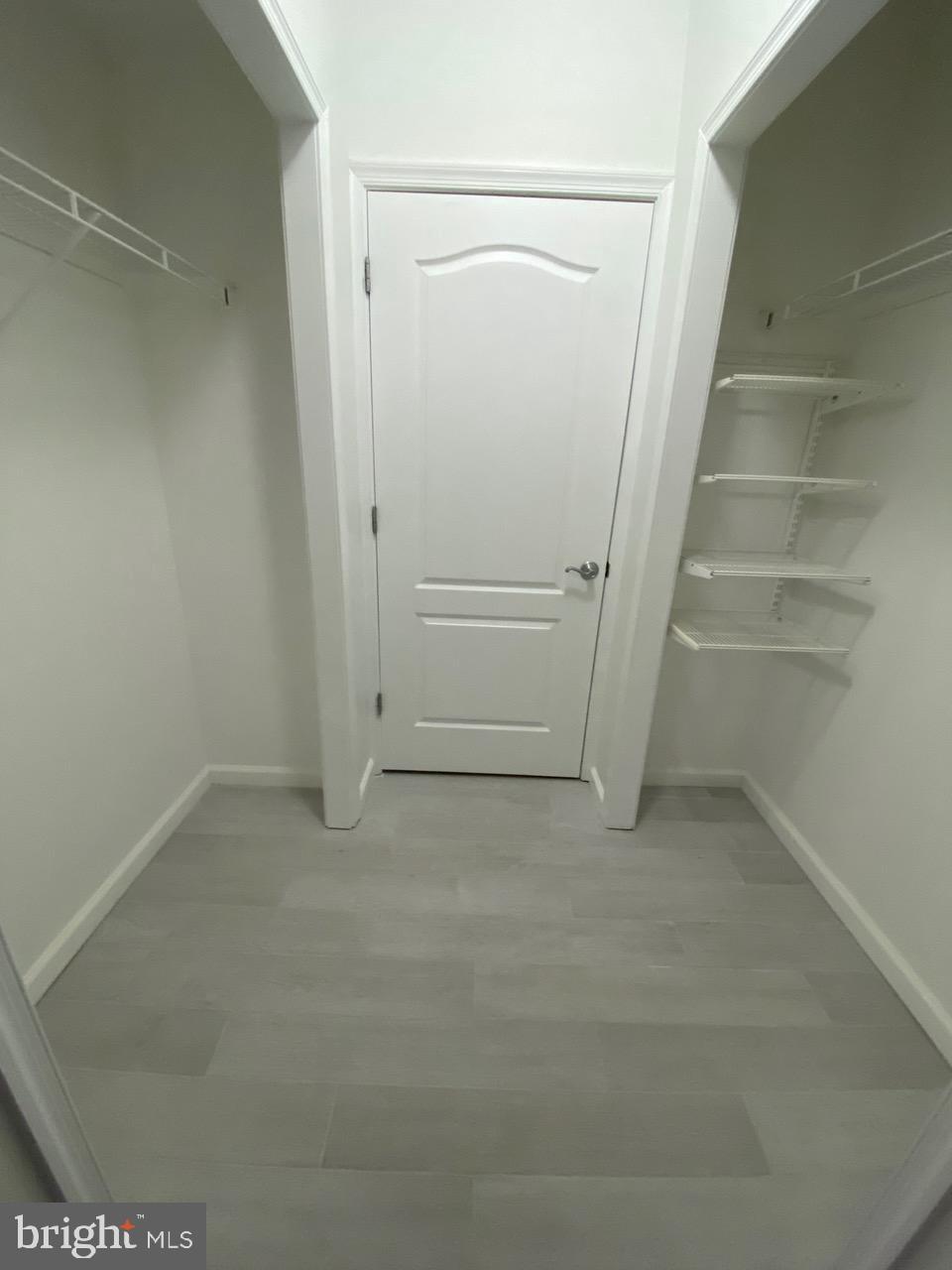 1111 11th Street Northwest, Unit 108 Washington, DC 20001 - Photo 23 of 27 Spacious, organized closet with modern design.