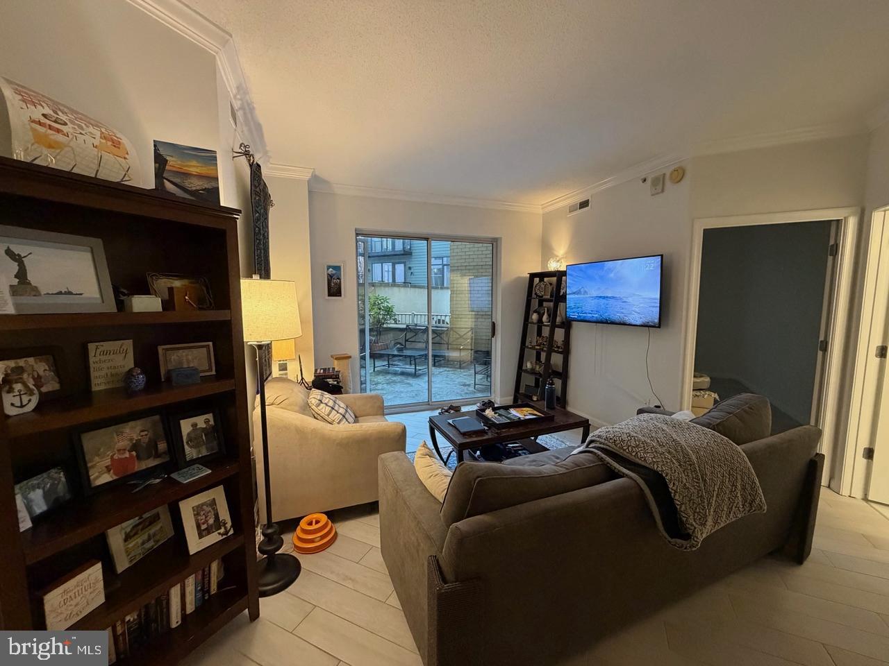 1111 11th Street Northwest, Unit 108 Washington, DC 20001 - Photo 7 of 27 Cozy living space with natural light.
