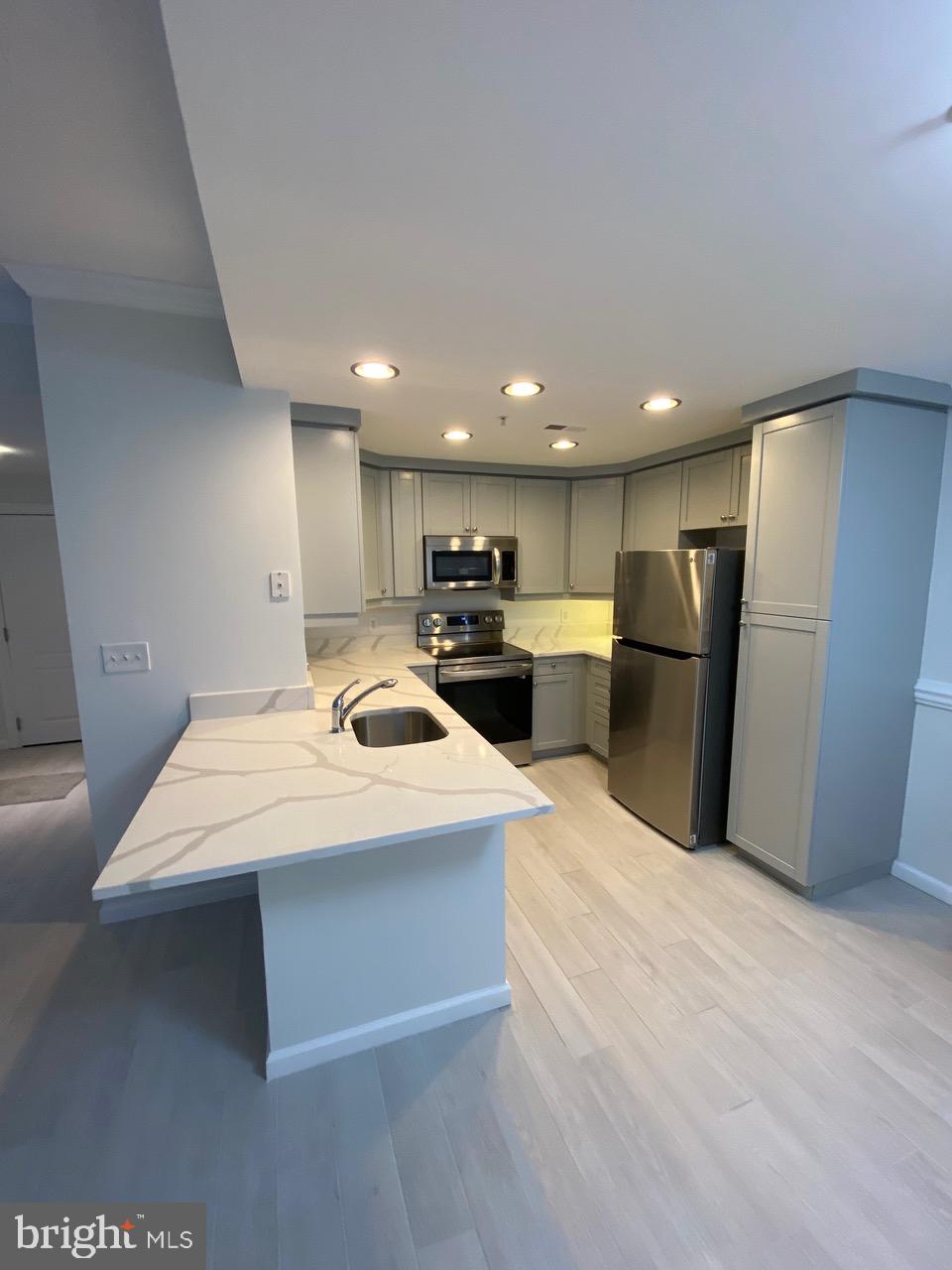 1111 11th Street Northwest, Unit 108 Washington, DC 20001 - Photo 10 of 27 Kitchen w/ Recessed Lighting