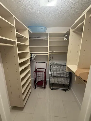 a view of room with a baby crib