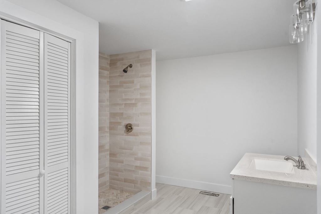 32 Laurel Lane Raynham, MA 02767 - Photo 11 of 30 a bathroom with a shower