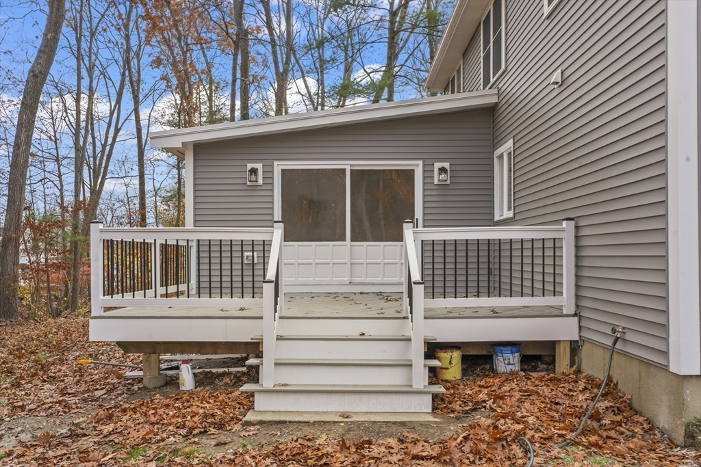 32 Laurel Lane Raynham, MA 02767 - Photo 20 of 30 a front view of a house with a window