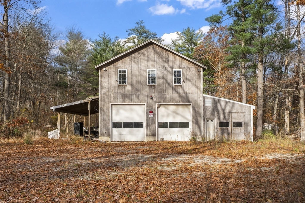 32 Laurel Lane Raynham, MA 02767 - Photo 24 of 30 front view of a house with a yard
