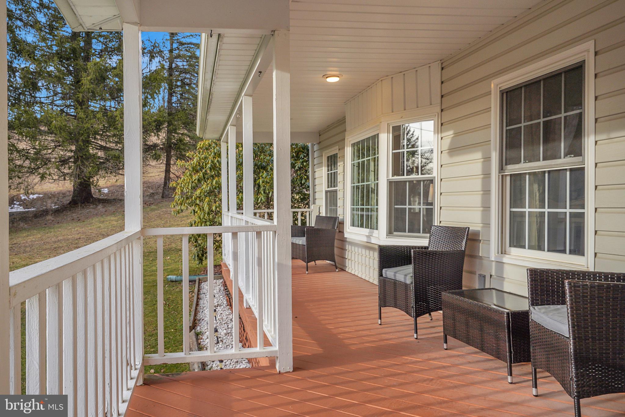259 A A-Frame Road Coudersport, PA 16915 - Photo 3 of 130 Charming porch with serene views.
