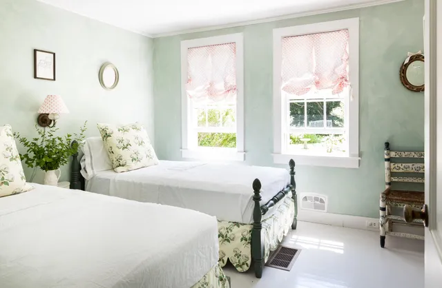 a bath room with a sink and a mirror