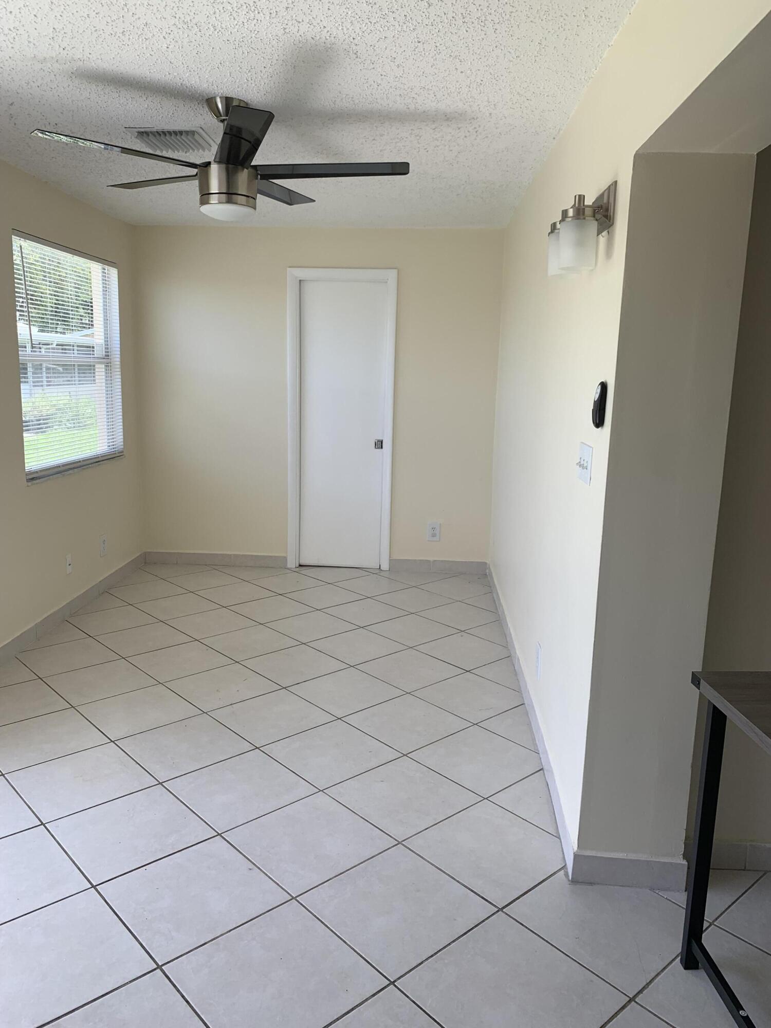 2802 Regency Court Delray Beach, FL 33445 - Photo 6 of 10 a view of an empty room