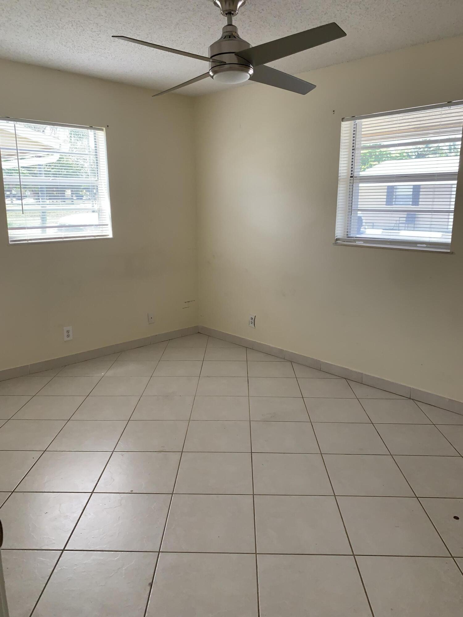 2802 Regency Court Delray Beach, FL 33445 - Photo 10 of 10 a view of an empty room with a window