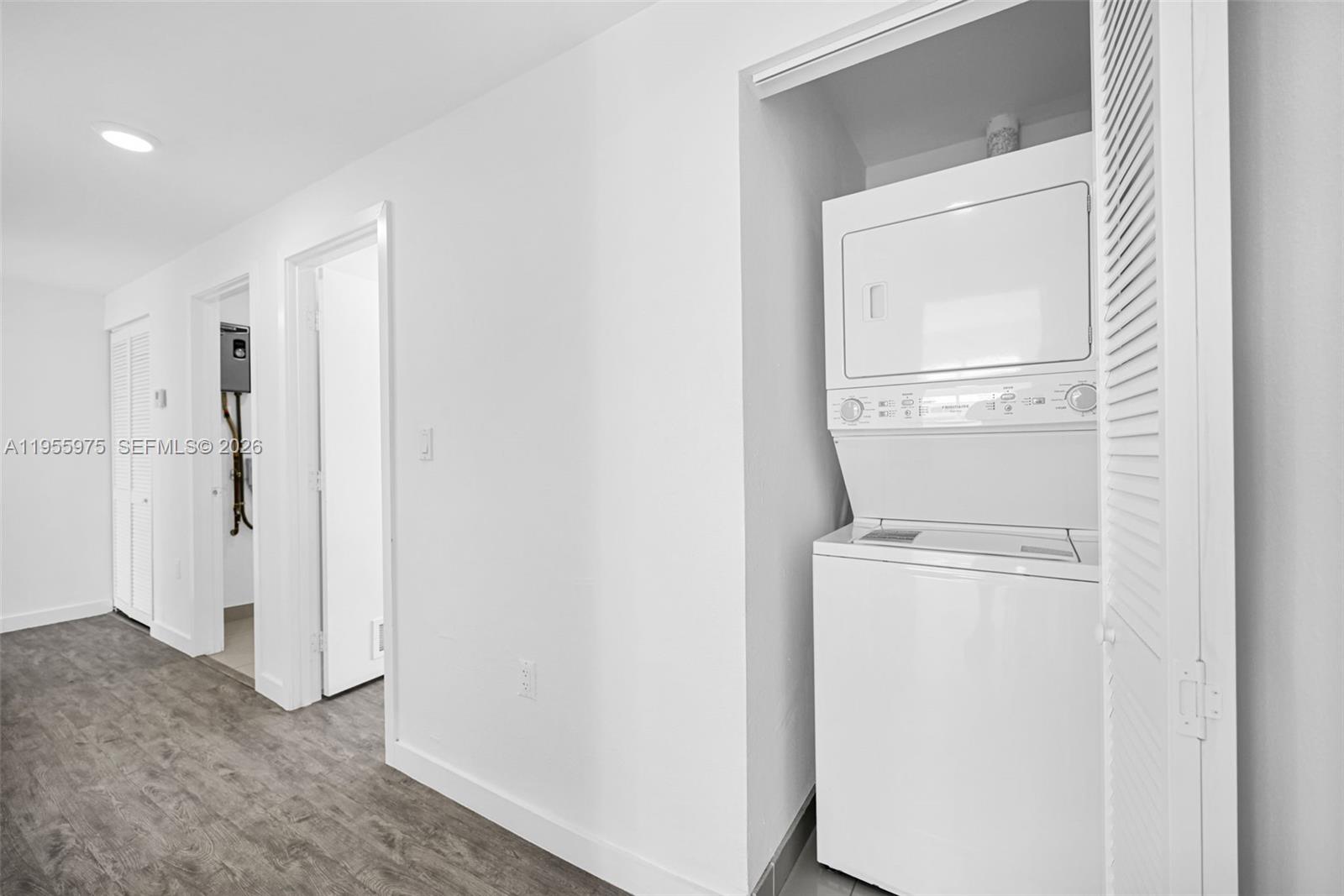 25874 Southwest 139th Court Homestead, FL 33033 - Photo 17 of 56 a view of storage and utility room with washer and dryer