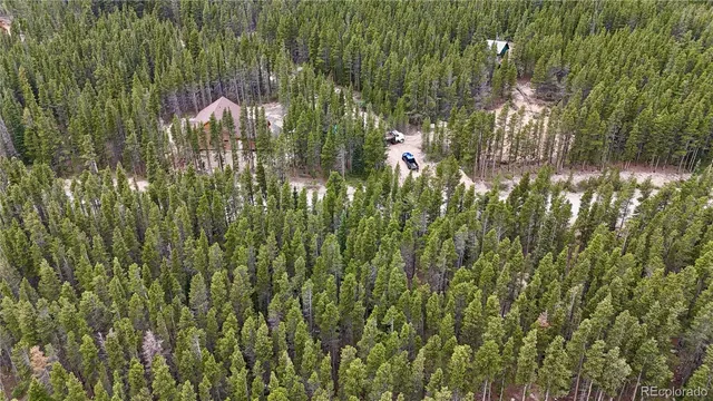 a view of balcony with yard