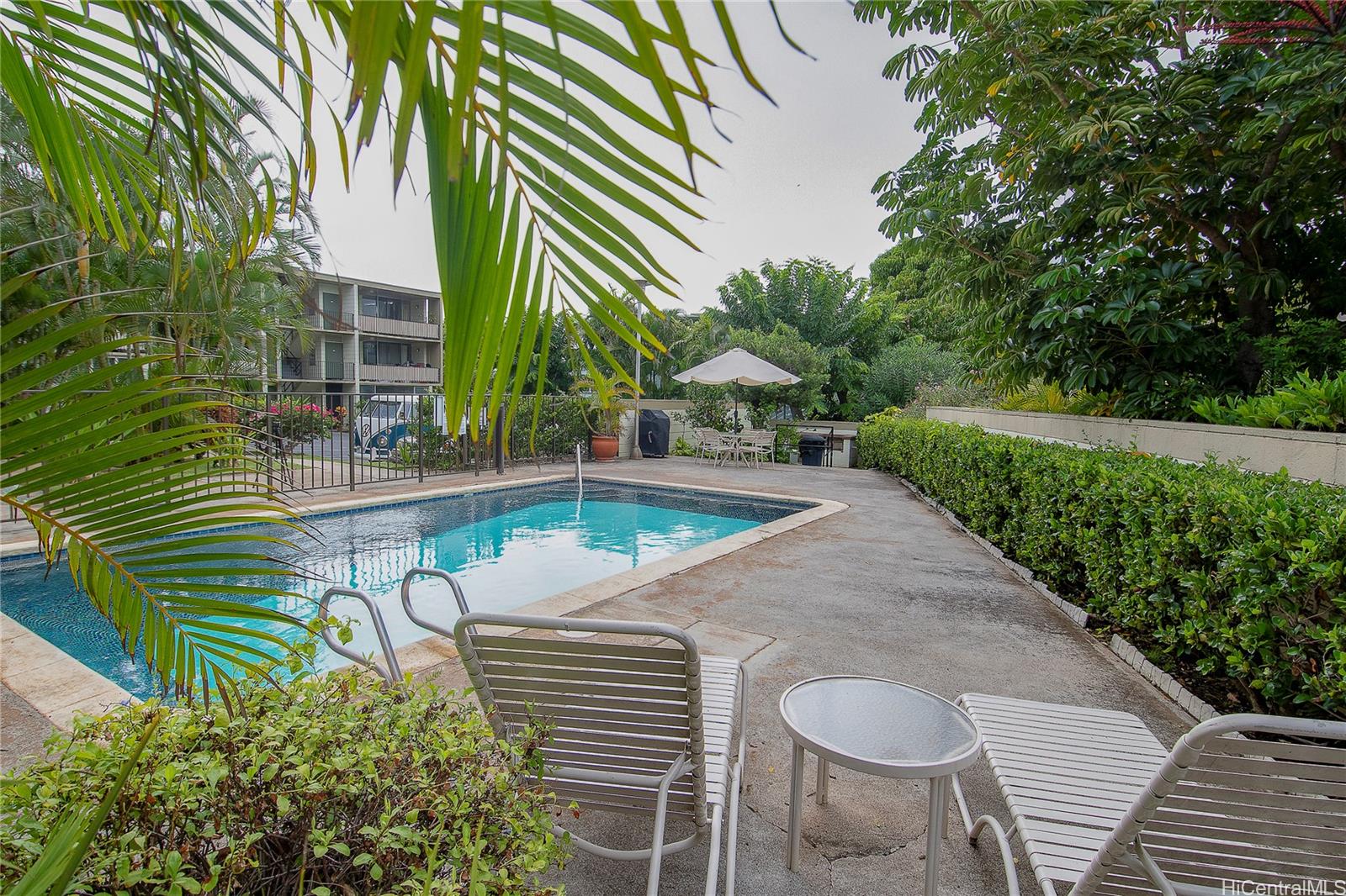 3103 Pualei Circle, Unit 204 Honolulu, HI 96815 - Photo 17 of 17 a view of a swimming pool with a patio
