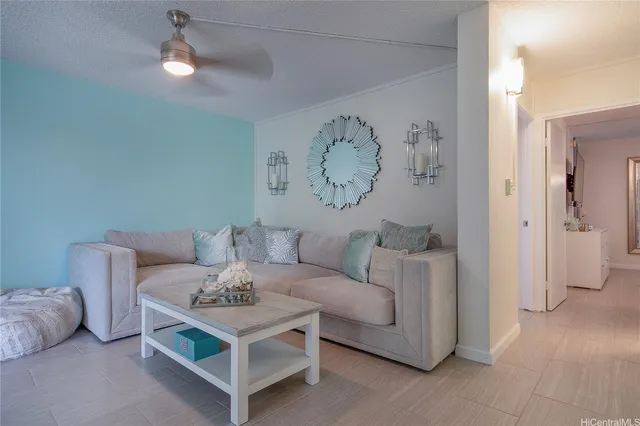 a living room with furniture and a table