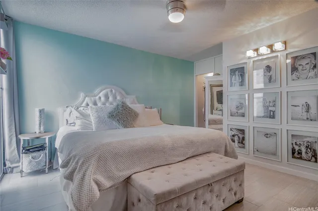 a bedroom with a bed and a table