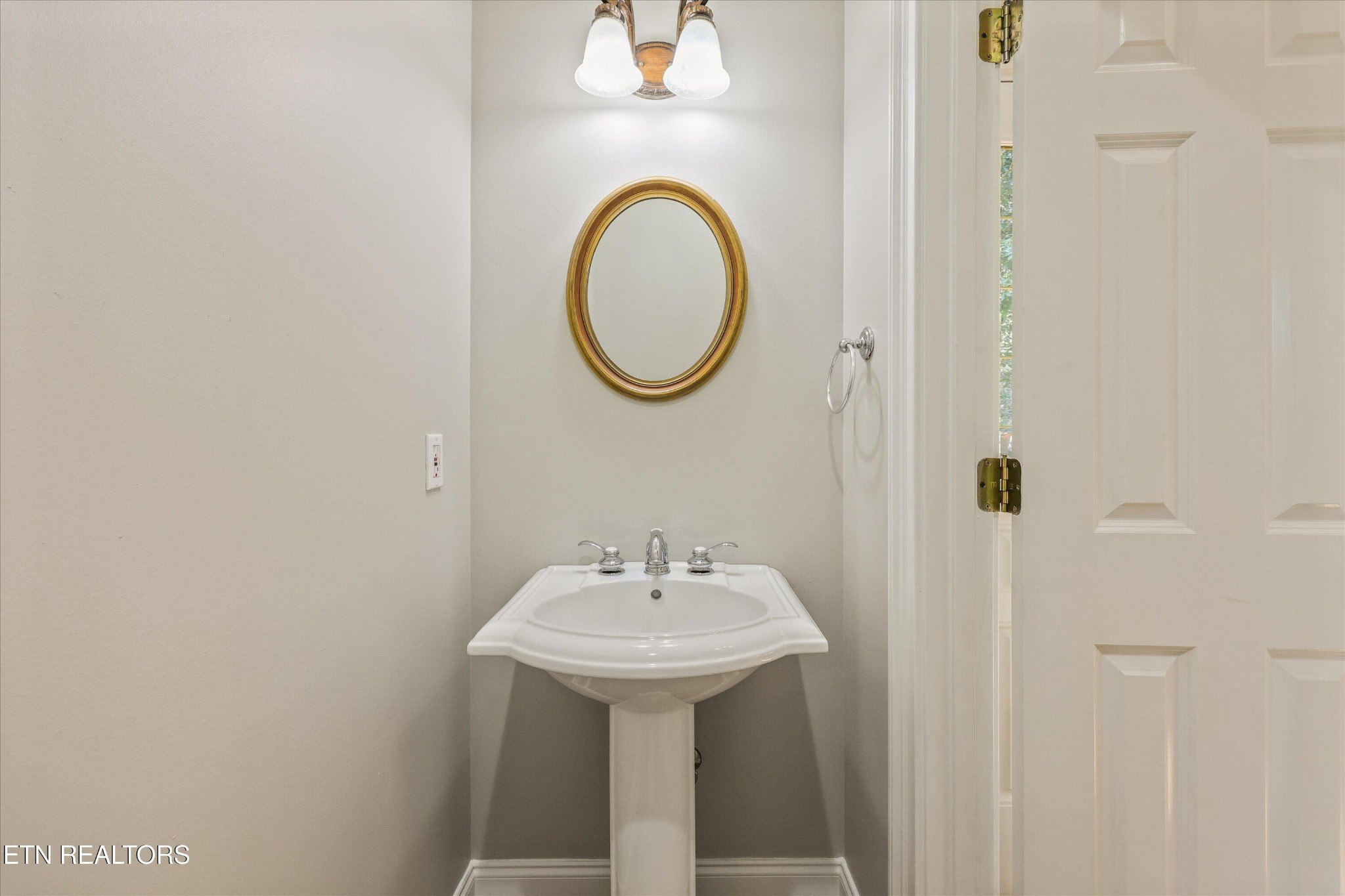 865 Stonegate Way Townsend, TN 37882 - Photo 41 of 60 a bathroom with a sink and a mirror