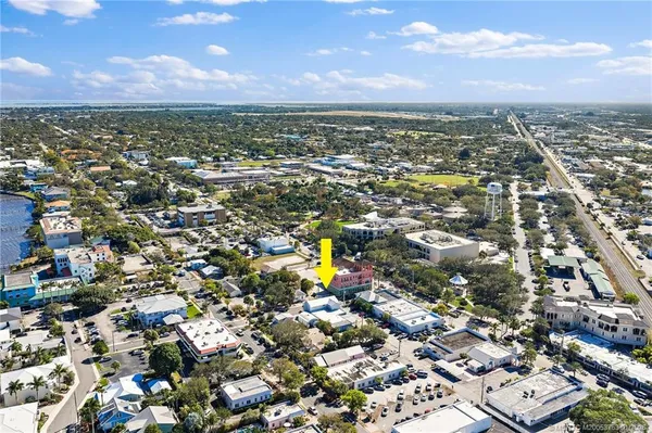an aerial view of residential building and city