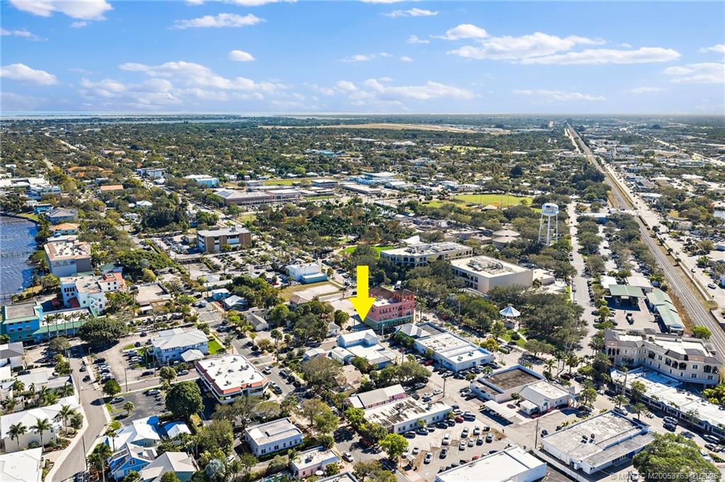 310 Southeast Denver Avenue, Unit 2 Stuart, FL 34994 - Photo 7 of 50 an aerial view of residential houses with outdoor space