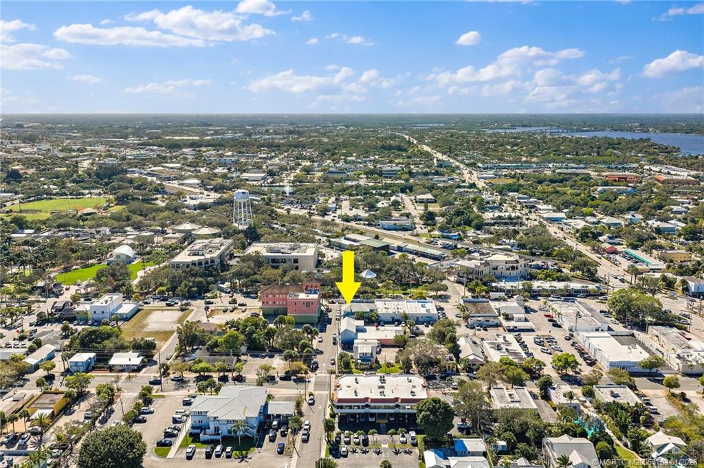 310 Southeast Denver Avenue, Unit 2 Stuart, FL 34994 - Photo 8 of 50 an aerial view of residential building and city