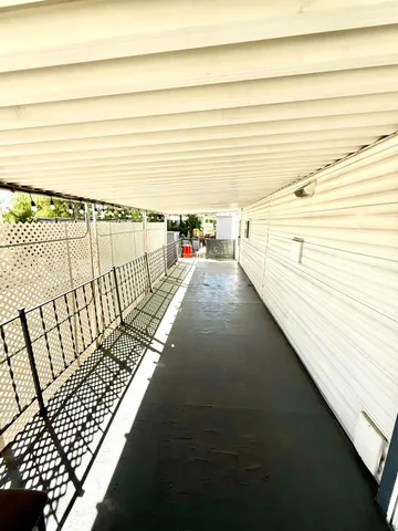 a view of a balcony with an ocean view