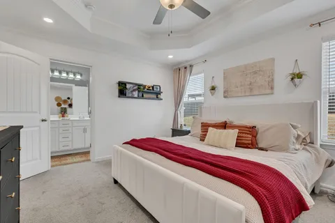 a bathroom with a sink vanity and a mirror