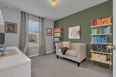 a living room with furniture and a couch