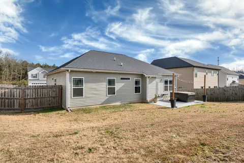 a view of a pathway with a yard