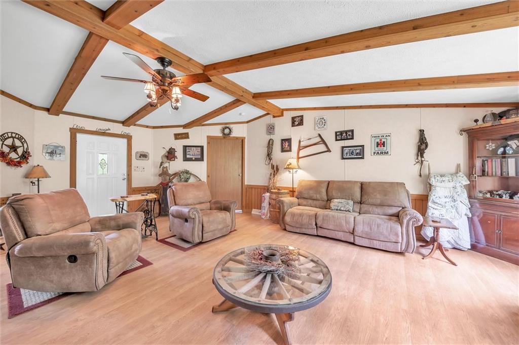 303 Wilhelm Road Rural Valley, PA 16249 - Photo 14 of 25 a living room with furniture and a rug