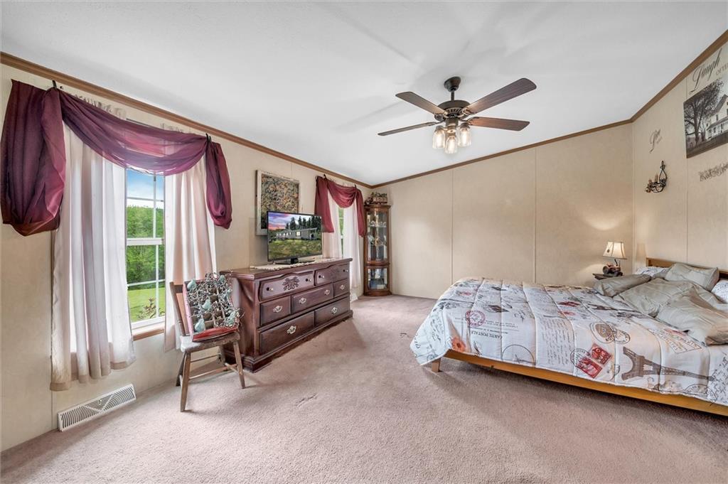 303 Wilhelm Road Rural Valley, PA 16249 - Photo 18 of 25 a bedroom with furniture and a window