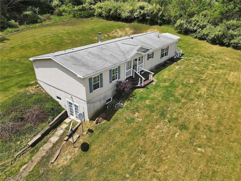 303 Wilhelm Road Rural Valley, PA 16249 - Photo 23 of 25 a aerial view of a house with a yard