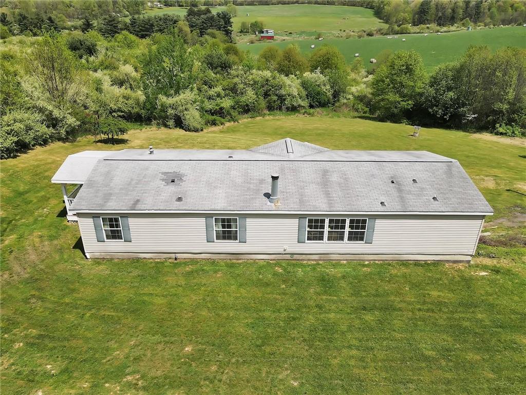 303 Wilhelm Road Rural Valley, PA 16249 - Photo 24 of 25 a view of a house with a yard