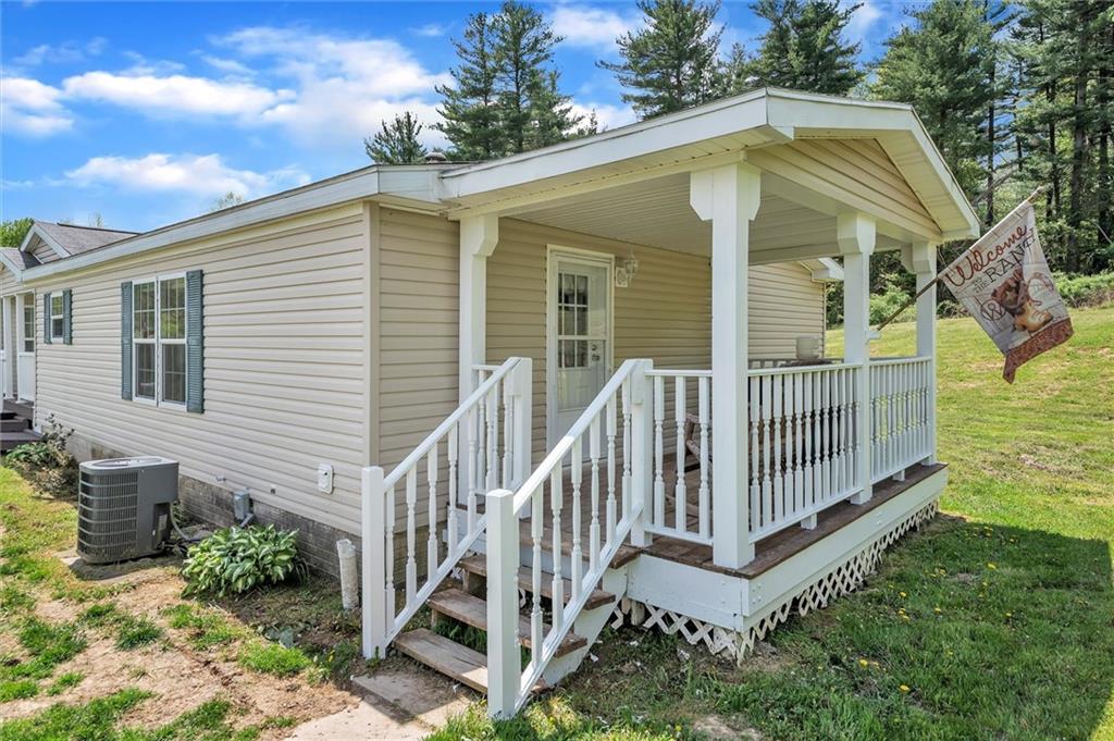 303 Wilhelm Road Rural Valley, PA 16249 - Photo 7 of 25 a view of a house with wooden fence