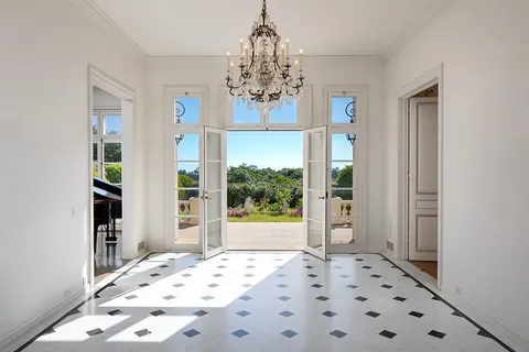 a view of a chandelier in a bedroom