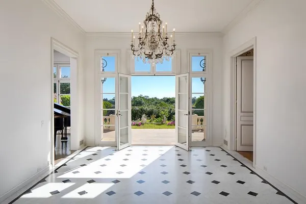 a view of a chandelier in a bedroom