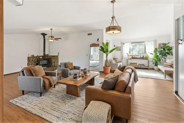 a kitchen with stainless steel appliances granite countertop a refrigerator and a stove
