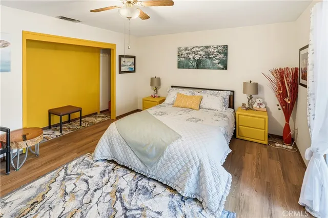 a bathroom with a toilet a sink and a mirror