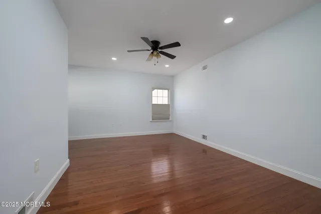 a view of a room with racks on the wall