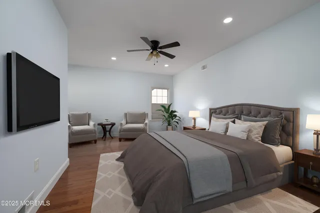 a bathroom with a granite countertop toilet sink and bathtub