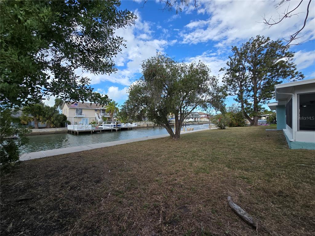 13737 Michelle Avenue Hudson, FL 34667 - Photo 22 of 25 a view of road with trees