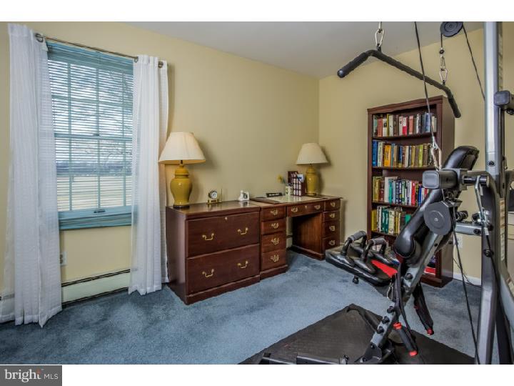 27274 Mt Pleasant Road Columbus, NJ 08022 - Photo 18 of 25 a room with a book shelf and a window