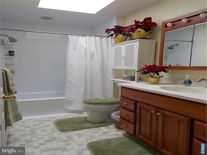 27274 Mt Pleasant Road Columbus, NJ 08022 - Photo 19 of 25 a bathroom with a sink and a mirror