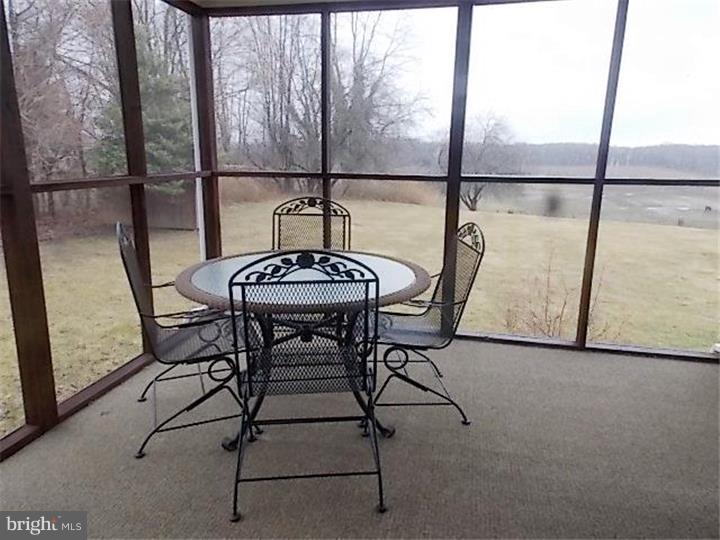 27274 Mt Pleasant Road Columbus, NJ 08022 - Photo 23 of 25 a view of a room with furniture and window