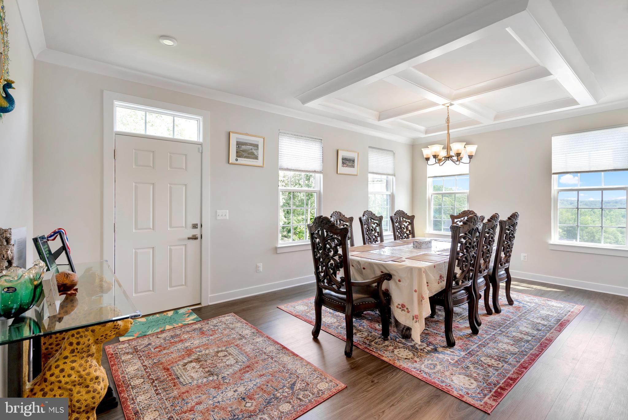 295 Potomac Run Road Fredericksburg, VA 22405 - Photo 11 of 33 a view of a dining room with furniture and wooden floor